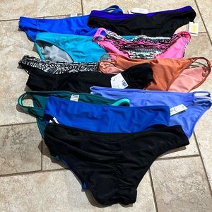 Assortment of xl bathing suit bottoms all are new. Quantity 11